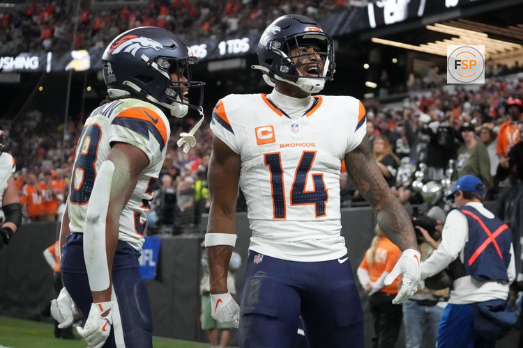 Nov 24, 2024; Paradise, Nevada, USA; Denver Broncos wide receiver Courtland Sutton (14) celebrates with running back Jaleel McLaughlin (38) after scoring on a 18-yard touchdown pass against the Las Vegas Raiders at Allegiant Stadium. Credit: Kirby Lee-Imagn Images