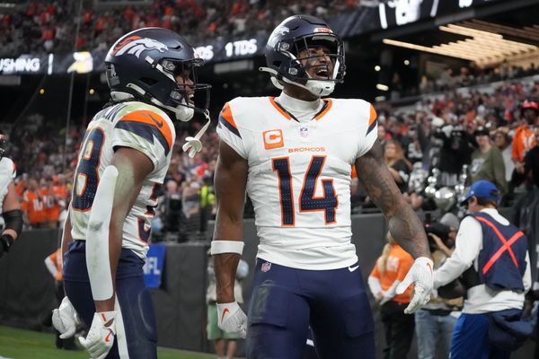 Nov 24, 2024; Paradise, Nevada, USA; Denver Broncos wide receiver Courtland Sutton (14) celebrates with running back Jaleel McLaughlin (38) after scoring on a 18-yard touchdown pass against the Las Vegas Raiders at Allegiant Stadium. Mandatory Credit: Kirby Lee-Imagn Images