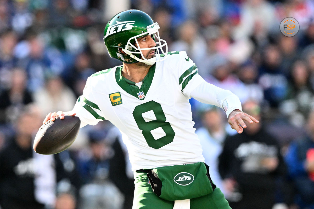 Oct 27, 2024; Foxborough, Massachusetts, USA; New York Jets quarterback Aaron Rodgers (8) looks to pass against the New England Patriots during the second half at Gillette Stadium. Credit: Brian Fluharty-Imagn Images