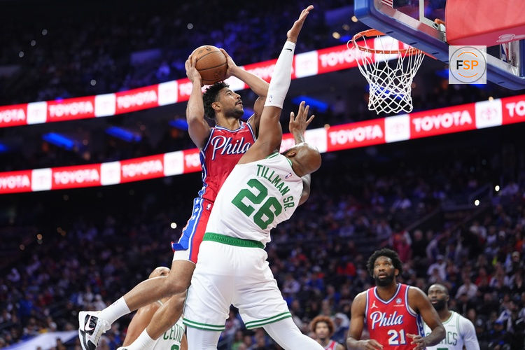 Oct 31, 2025; Philadelphia, Pennsylvania, USA; Philadelphia 76ers guard Quentin Grimes (5) drives to shoot against Boston Celtics forward Xavier Tillman (26) in the fourth quarter at Xfinity Mobile Arena. Credit: Kyle Ross-Imagn Images