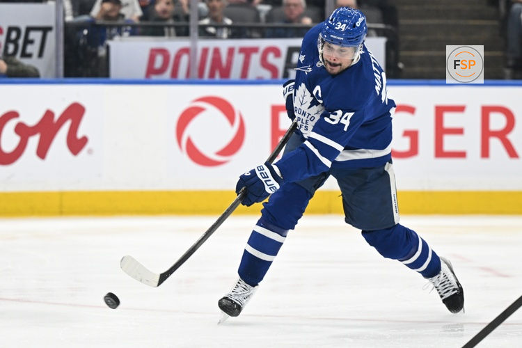 Mar 7, 2026; Toronto, Ontario, CAN;  Toronto Maple Leafs forward Auston Matthews (34) shoots the puck against the Tampa Bay Lightning in the third period at Scotiabank Arena. Credit: Dan Hamilton-Imagn Images