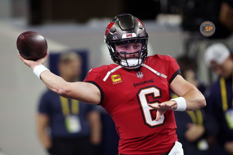 Dec 22, 2024; Arlington, Texas, USA; Tampa Bay Buccaneers quarterback Baker Mayfield (6) throws a pass before the game against the Dallas Cowboys at AT&T Stadium. Credit: Tim Heitman-Imagn Images