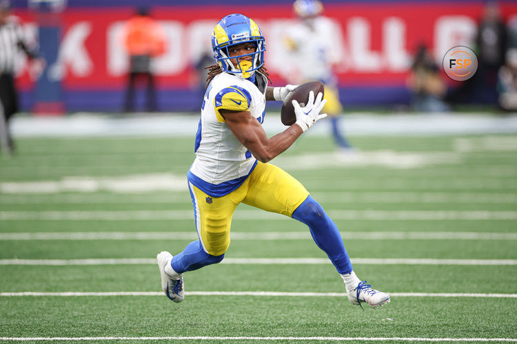 Dec 31, 2023; East Rutherford, New Jersey, USA; Los Angeles Rams wide receiver Tutu Atwell (5) gains yards after a catch during the second half against the New York Giants at MetLife Stadium. Credit: Vincent Carchietta-USA TODAY Sports