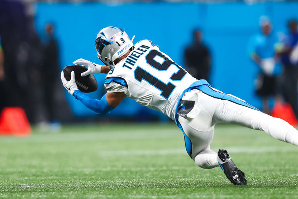 CHARLOTTE, NC - SEPTEMBER 18: Adam Thielen #19 of the Carolina Panthers makes a diving catch during a football game against the New Orleans Saints at Bank of America Stadium in Charlotte, North Carolina on Sep 18, 2023.  (Photo by David Jensen/Icon Sportswire)