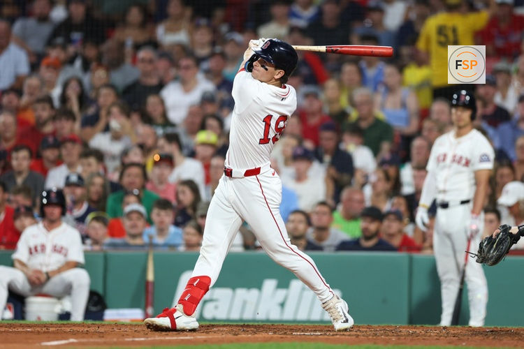 Jul 7, 2025; Boston, Massachusetts, USA; Boston Red Sox designated hitter Roman Anthony (19) hits a two run home run during the fifth inning against the Colorado Rockies at Fenway Park. Credit: Paul Rutherford-Imagn Images