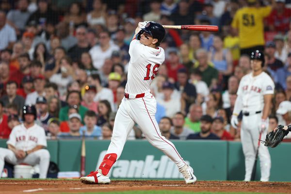 Jul 7, 2025; Boston, Massachusetts, USA; Boston Red Sox designated hitter Roman Anthony (19) hits a two run home run during the fifth inning against the Colorado Rockies at Fenway Park. Mandatory Credit: Paul Rutherford-Imagn Images