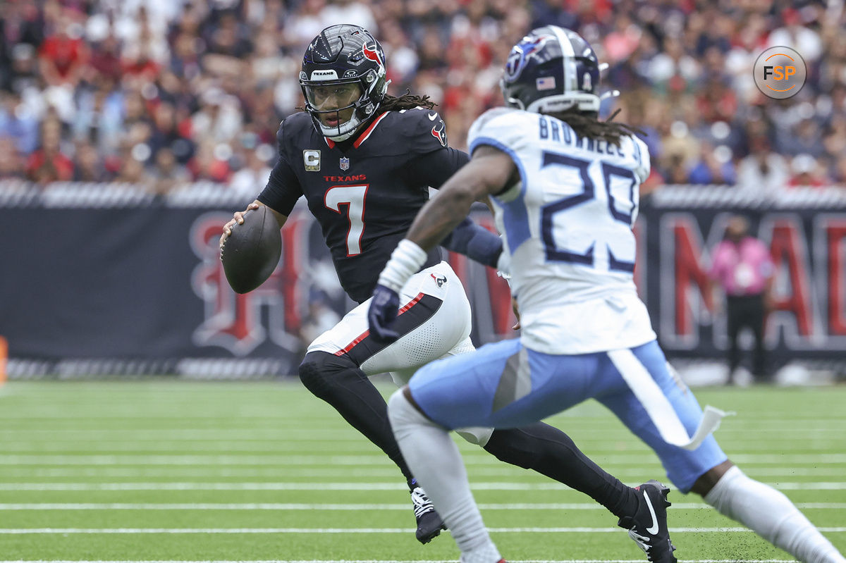 Nov 24, 2024; Houston, Texas, USA; Houston Texans quarterback C.J. Stroud (7) runs with the ball during the second quarter against the Tennessee Titans at NRG Stadium. Credit: Troy Taormina-Imagn Images