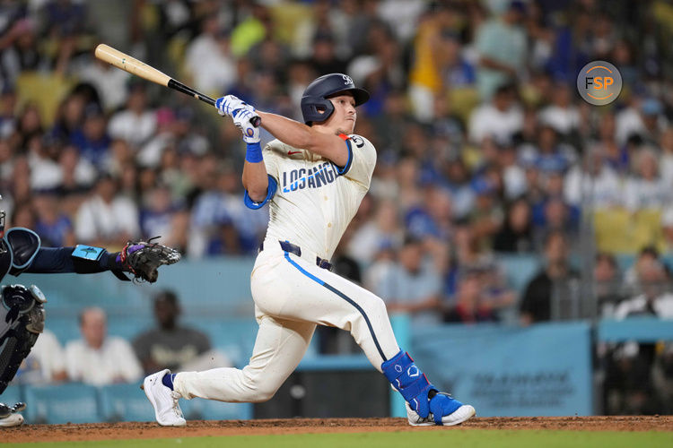 Aug 24, 2024; Los Angeles, California, USA; Los Angeles Dodgers center fielder Tommy Edman (25) bats against the Tampa Bay Rays at Dodger Stadium. Credit: Kirby Lee-USA TODAY Sports