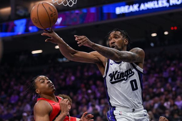 Jan 21, 2026; Sacramento, California, USA; Sacramento Kings guard Malik Monk (0) passes the ball against the Toronto Raptors during the second quarter at Golden 1 Center. Mandatory Credit: Ed Szczepanski-Imagn Images