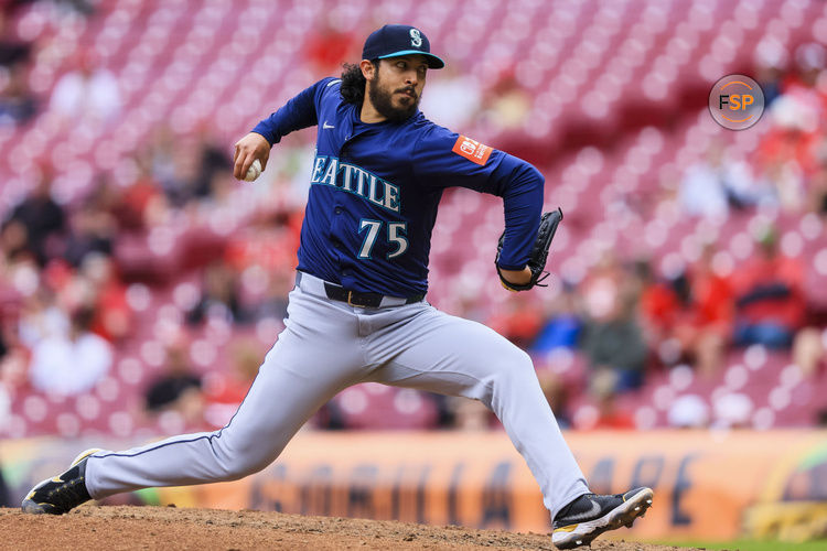 Apr 17, 2025; Cincinnati, Ohio, USA; Seattle Mariners relief pitcher Andres Munoz (75) pitches against the Cincinnati Reds in the tenth inning at Great American Ball Park. Credit: Katie Stratman-Imagn Images