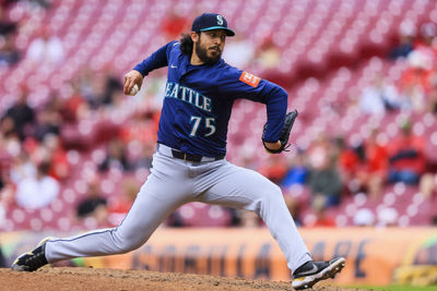 Apr 17, 2025; Cincinnati, Ohio, USA; Seattle Mariners relief pitcher Andres Munoz (75) pitches against the Cincinnati Reds in the tenth inning at Great American Ball Park. Mandatory Credit: Katie Stratman-Imagn Images