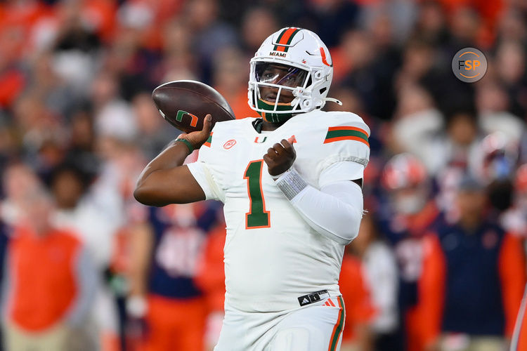 Nov 30, 2024; Syracuse, New York, USA; Miami Hurricanes quarterback Cam Ward (1) passes the ball against the Syracuse Orange during the first half at the JMA Wireless Dome. Credit: Rich Barnes-Imagn Images