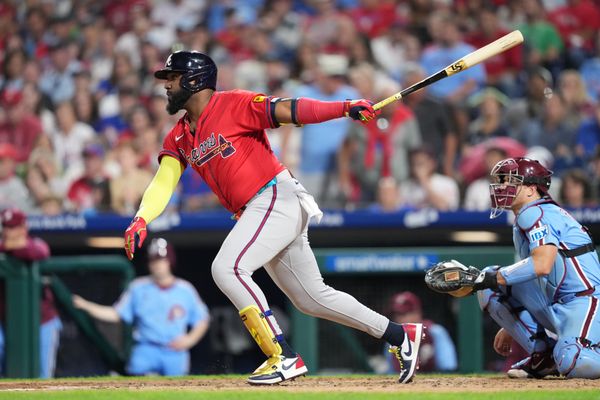 Aug 28, 2025; Philadelphia, Pennsylvania, USA; Atlanta Braves designated hitter Marcell Ozuna (20) hits a single against the Philadelphia Phillies in the seventh inning at Citizens Bank Park. Mandatory Credit: Kyle Ross-Imagn Images