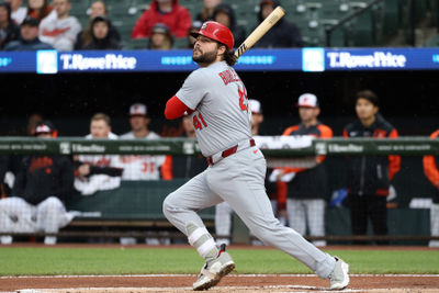 May 27, 2025; Baltimore, Maryland, USA; St. Louis Cardinals first baseman Alec Burleson (41) hits a single during the first inning against the Baltimore Orioles at Oriole Park at Camden Yards. Mandatory Credit: Daniel Kucin Jr.-Imagn Images