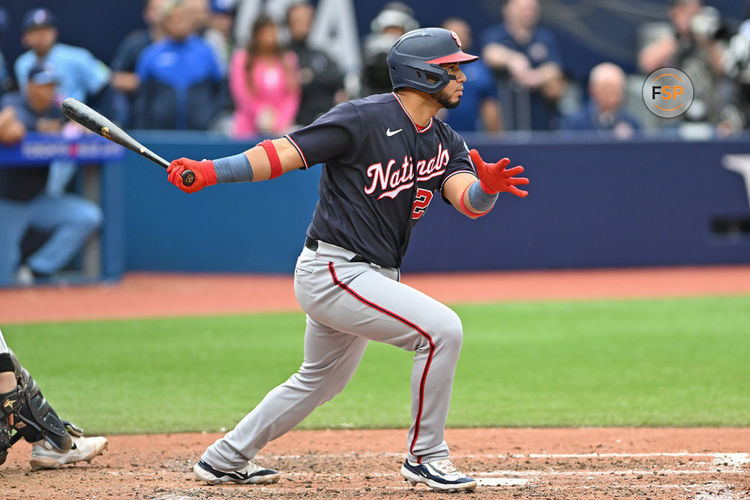 TORONTO, ON - AUGUST 03: Washington Nationals Catcher Keibert Ruiz (20) hits a single in the ninth inning during the regular season MLB game between the Washington Nationals and Toronto Blue Jays on August 30, 2023 at Rogers Centre in Toronto, ON. (Photo by Gerry Angus/Icon Sportswire)TORONTO, ON - AUGUST 30: (Photo by Gerry Angus/Icon Sportswire)