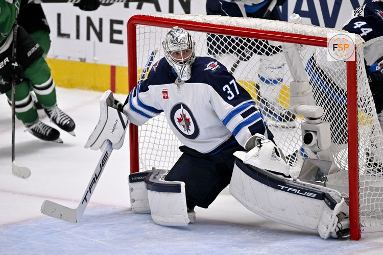 May 17, 2025; Dallas, Texas, USA; Winnipeg Jets goaltender Connor Hellebuyck (37) faces the Dallas Stars attack during the second period in game six of the second round of the 2025 Stanley Cup Playoffs at American Airlines Center. Credit: Jerome Miron-Imagn Images
