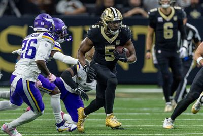 Oct 11, 2026; New Orleans, Louisiana, USA;  New Orleans Saints running back Kendre Miller (5) runs against Minnesota Vikings defensive back Theo Jackson (26) during the second half at Caesars Superdome.  Mandatory Credit: Stephen Lew-Imagn Images