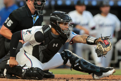 Apr 21, 2025; Miami, Florida, USA; Miami Marlins catcher Agustin Ramirez (50) plays his position against the Cincinnati Reds during the third inning at loanDepot Park. Mandatory Credit: Sam Navarro-Imagn Images