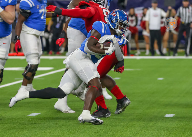 HOUSTON, TX - DECEMBER 28:  Mississippi Rebels running back Zach Evans (6) carries the ball in the first quarter during the TaxAct Texas Bowl between the Texas Tech Red Raiders and Ole Miss Rebels on December 28, 2022 at NRG Stadium in Houston, Texas.  (Photo by Leslie Plaza Johnson/Icon Sportswire)