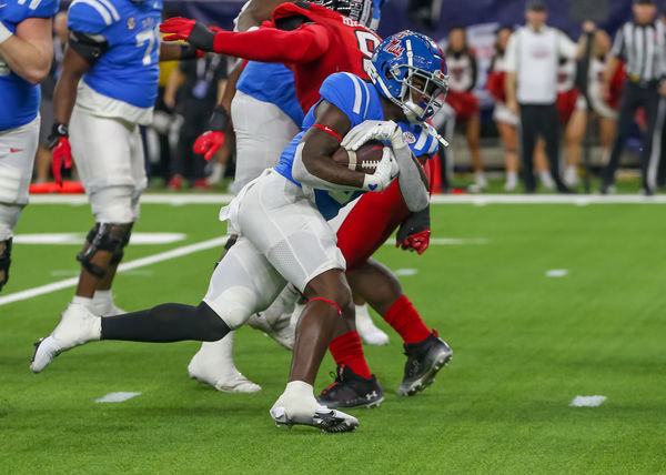 HOUSTON, TX - DECEMBER 28:  Mississippi Rebels running back Zach Evans (6) carries the ball in the first quarter during the TaxAct Texas Bowl between the Texas Tech Red Raiders and Ole Miss Rebels on December 28, 2022 at NRG Stadium in Houston, Texas.  (Photo by Leslie Plaza Johnson/Icon Sportswire)