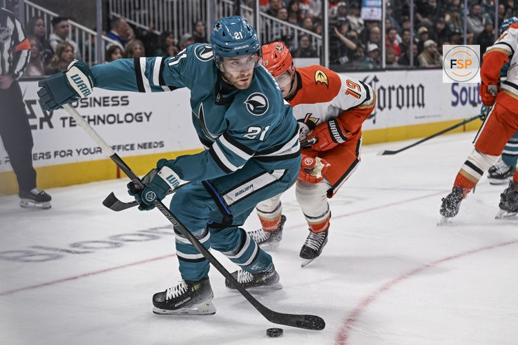 Apr 1, 2026; San Jose, California, USA; San Jose Sharks center Alexander Wennberg (21) controls the puck during the second period against the Anaheim Ducks at SAP Center at San Jose. Credit: Justine Willard-Imagn Images