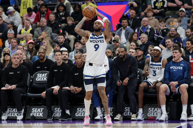 Jan 30, 2025; Salt Lake City, Utah, USA;  Minnesota Timberwolves guard Nickeil Alexander-Walker (9) shoots an open jump shot against the Utah Jazz during the second half at Delta Center. Credit: Chris Nicoll-Imagn Images