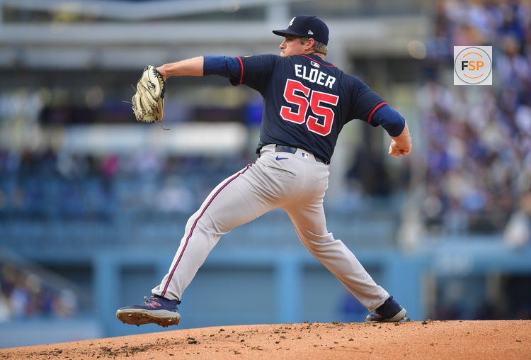 Apr 2, 2025; Los Angeles, California, USA; Atlanta Braves pitcher Bryce Elder (55) throws during the first inning against the Los Angeles Dodgers at Dodger Stadium. Credit: Gary A. Vasquez-Imagn Images