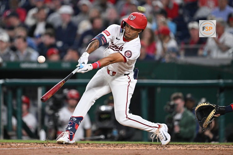 Apr 22, 2026; Washington, District of Columbia, USA;  Washington Nationals outfielder Daylen Lile (4) hits a double in the fifth inning against the Atlanta Braves at Nationals Park. Credit: Jamie Sabau-Imagn Images