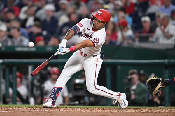 Apr 22, 2026; Washington, District of Columbia, USA;  Washington Nationals outfielder Daylen Lile (4) hits a double in the fifth inning against the Atlanta Braves at Nationals Park. Mandatory Credit: Jamie Sabau-Imagn Images