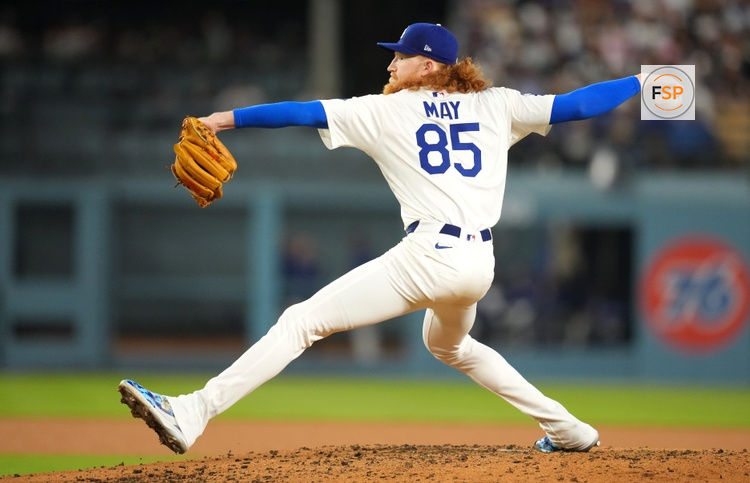 Apr 14, 2025; Los Angeles, California, USA; Los Angeles Dodgers pitcher Dustin May (85) throws during the third inning against the Colorado Rockies at Dodger Stadium. Credit: Kirby Lee-Imagn Images