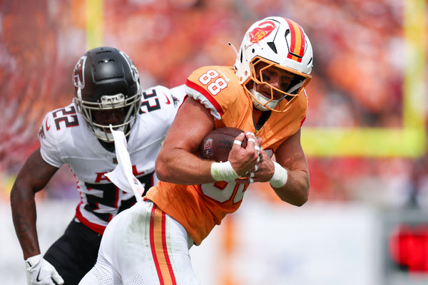 Oct 27, 2024; Tampa, Florida, USA; Tampa Bay Buccaneers tight end Cade Otton (88) runs with the ball against the Atlanta Falcons in the second quarter at Raymond James Stadium. Mandatory Credit: Nathan Ray Seebeck-Imagn Images