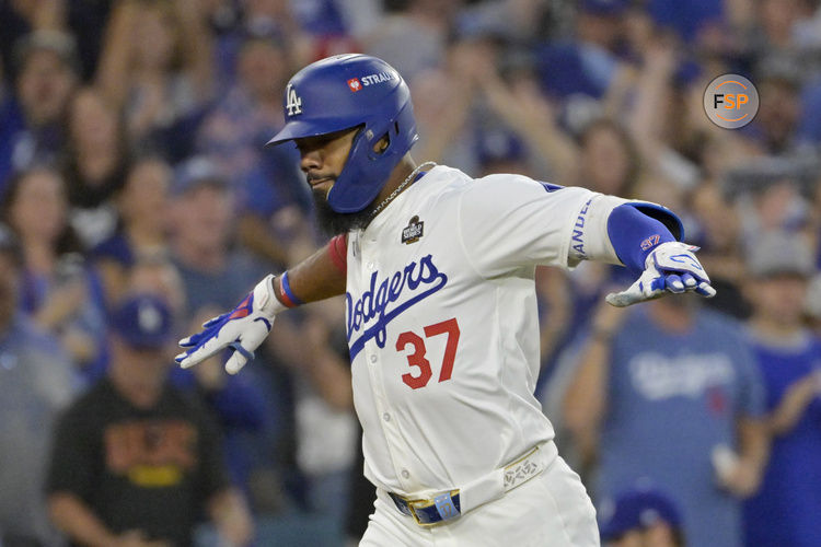 Oct 26, 2024; Los Angeles, California, USA; Los Angeles Dodgers outfielder Teoscar Hernandez (37) celebrates after hitting a two run home run in the third inning against the New York Yankees during game two of the 2024 MLB World Series at Dodger Stadium. Credit: Jayne Kamin-Oncea-Imagn Images