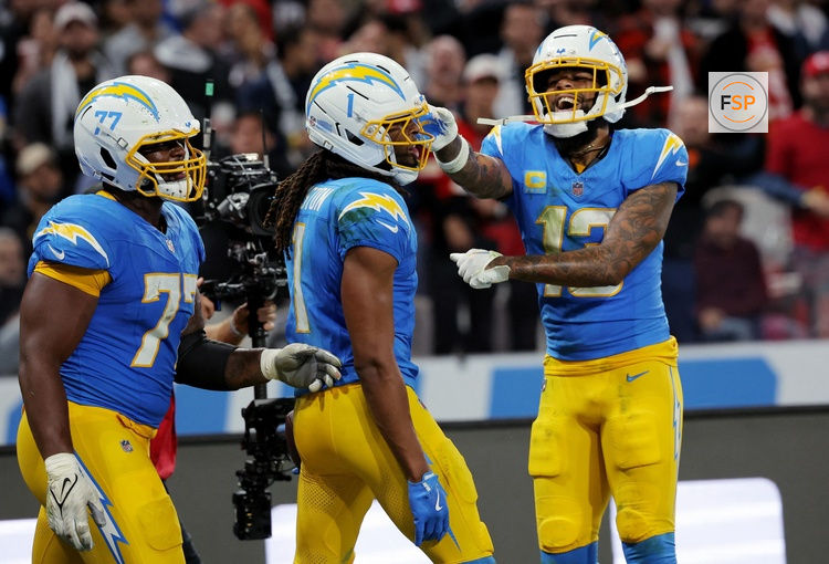 [US, Mexico & Canada customers only] Sep 5, 2025; Sao Paulo, BRAZIL;  Los Angeles Chargers wide receiver Quentin Johnston (1) celebrates with wide receiver Keenan Allen (13) after scoring a touchdown against the Kansas City Chiefs in the second half during a N