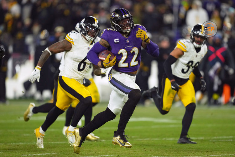 Jan 11, 2025; Baltimore, Maryland, USA; Baltimore Ravens running back Derrick Henry (22) runs to score a touchdown against the Pittsburgh Steelers in the third quarter in an AFC wild card game at M&T Bank Stadium. Credit: Mitch Stringer-Imagn Images