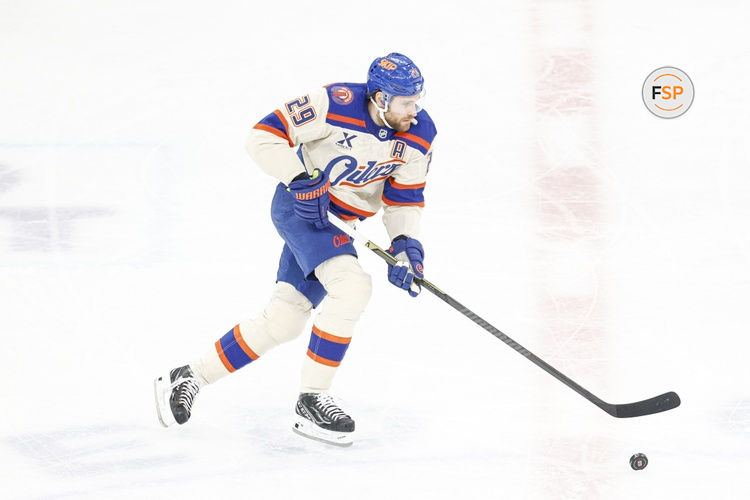 Jan 12, 2026; Chicago, Illinois, USA; Edmonton Oilers center Leon Draisaitl (29) controls the puck against the Chicago Blackhawks during the first period at United Center. Credit: Kamil Krzaczynski-Imagn Images