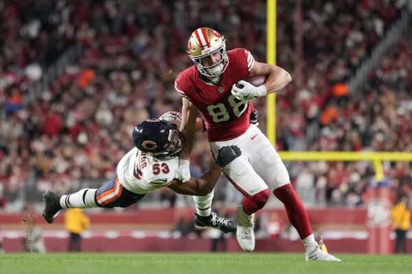 Dec 28, 2025; Santa Clara, California, USA;  Chicago Bears linebacker T.J. Edwards (53) tackles San Francisco 49ers tight end Jake Tonges (88) in the second half at Levi's Stadium. Mandatory Credit: Kyle Terada-Imagn Images