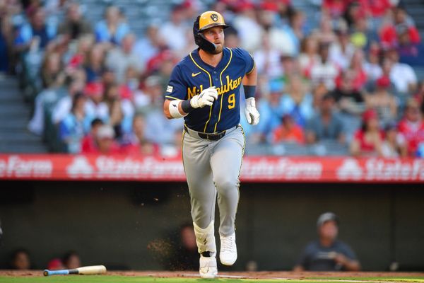 Jul 31, 2026; Anaheim, California, USA; Milwaukee Brewers first baseman Jake Bauers (9) runs after hitting a single against the Los Angeles Angels during the second inning at Angel Stadium. Mandatory Credit: Gary A. Vasquez-Imagn Images