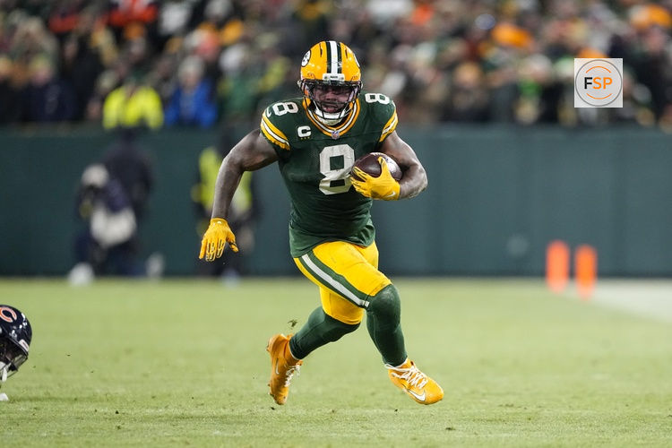 Dec 7, 2025; Green Bay, Wisconsin, USA;  Green Bay Packers running back Josh Jacobs (8) during the game against the Chicago Bears at Lambeau Field. Credit: Jeff Hanisch-Imagn Images
