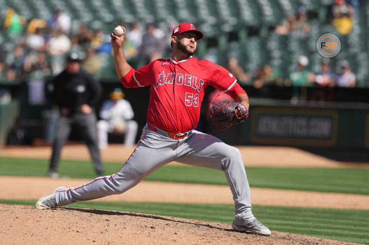 Jul 21, 2024; Oakland, California, USA; Los Angeles Angels relief pitcher Carlos Estevez (53) throws a pitch against the Oakland Athletics during the ninth inning at Oakland-Alameda County Coliseum. Mandatory Credit: Darren Yamashita-USA TODAY Sports