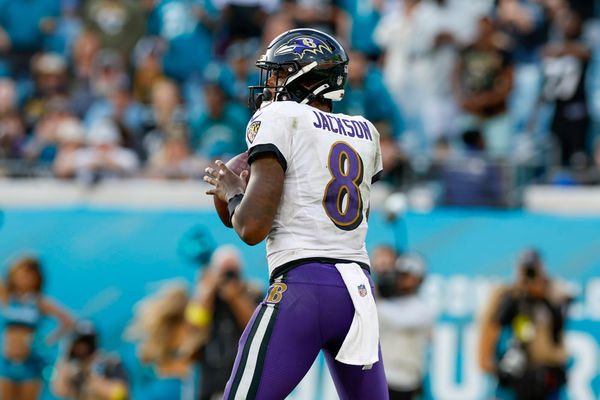 JACKSONVILLE, FL - NOVEMBER 27: Baltimore Ravens quarterback Lamar Jackson (8) throws a pass during the game between the Baltimore Ravens and the Jacksonville Jaguars on November 27, 2022 at TIAA Bank Field in Jacksonville, Fl.  (Photo by David Rosenblum/Icon Sportswire)