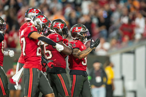 Dec 24, 2023; Tampa, Florida, USA; Tampa Bay Buccaneers safety Antoine Winfield Jr. (31) celebrates a turnover against the Jacksonville Jaguars in the fourth quarter at Raymond James Stadium. Mandatory Credit: Jeremy Reper-USA TODAY Sports