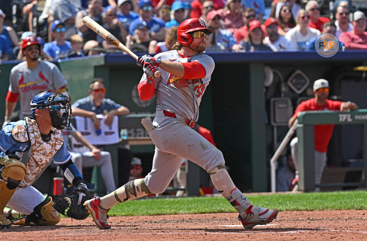 May 18, 2025; Kansas City, Missouri, USA;  St. Louis Cardinals second baseman Brendan Donovan (33) doubles in the ninth inning against the Kansas City Royals at Kauffman Stadium. Credit: Peter Aiken-Imagn Images