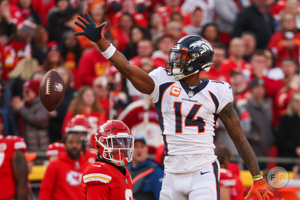 KANSAS CITY, MO - JANUARY 01: Denver Broncos wide receiver Courtland Sutton (14) drops the ball while signaling first down in the third quarter of an NFL game between the Denver Broncos and Kansas City Chiefs on January 1, 2023 at GEHA Field at.Arrowhead Stadium in Kansas City, MO. (Photo by Scott Winters/Icon Sportswire)     