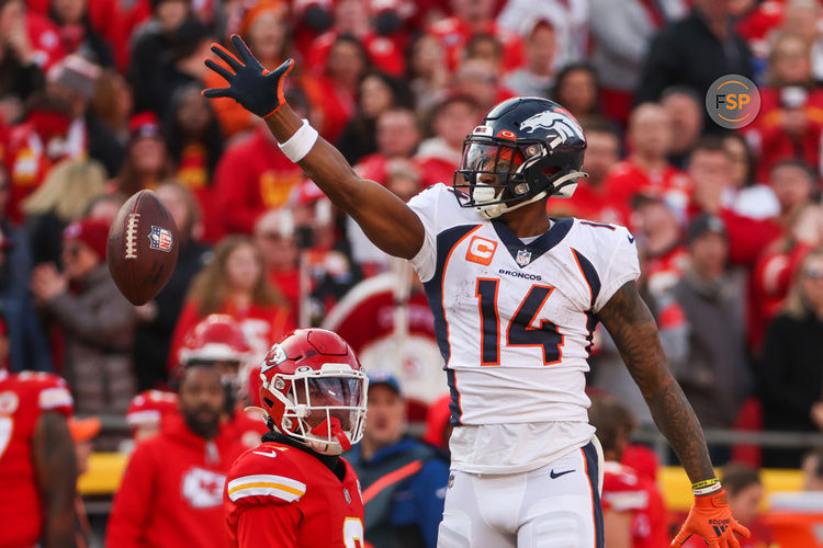 KANSAS CITY, MO - JANUARY 01: Denver Broncos wide receiver Courtland Sutton (14) drops the ball while signaling first down in the third quarter of an NFL game between the Denver Broncos and Kansas City Chiefs on January 1, 2023 at GEHA Field at.Arrowhead Stadium in Kansas City, MO. (Photo by Scott Winters/Icon Sportswire)     