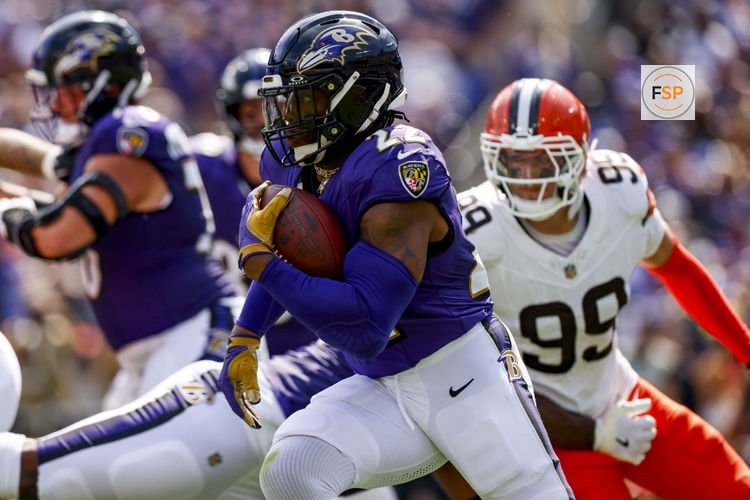 Sep 14, 2025; Baltimore, Maryland, USA; Baltimore Ravens running back Derrick Henry (22) runs the ball during the second quarter at M&T Bank Stadium. Credit: Peter Casey-Imagn Images