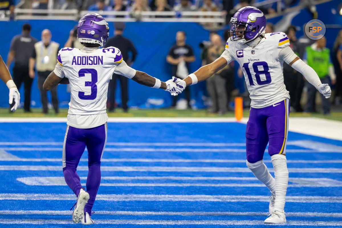 Jan 7, 2024; Detroit, Michigan, USA; Minnesota Vikings wide receiver Jordan Addison (3) catches a pass for a touchdown and celebrates with wide receiver Justin Jefferson (18) during second half of the game against the Detroit Lions at Ford Field. Credit: David Reginek-USA TODAY Sports