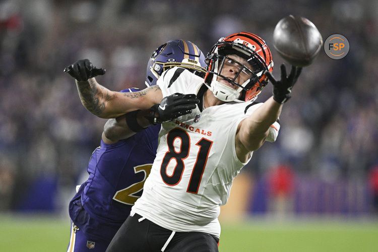 Nov 7, 2024; Baltimore, Maryland, USA; Cincinnati Bengals wide receiver Jermaine Burton (81) reaches for quarterback Joe Burrow (not pictured) throws ass Baltimore Ravens cornerback Brandon Stephens (21) defends during the second half   at M&T Bank Stadium. Credit: Tommy Gilligan-Imagn Images