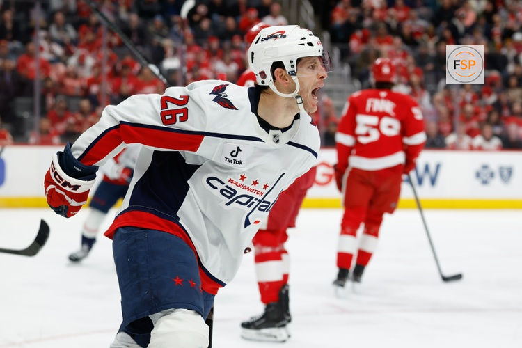 Jan 29, 2026; Detroit, Michigan, USA;  Washington Capitals center Nic Dowd (26) celebrates after scoring in the first period against the Detroit Red Wings at Little Caesars Arena. Credit: Rick Osentoski-Imagn Images