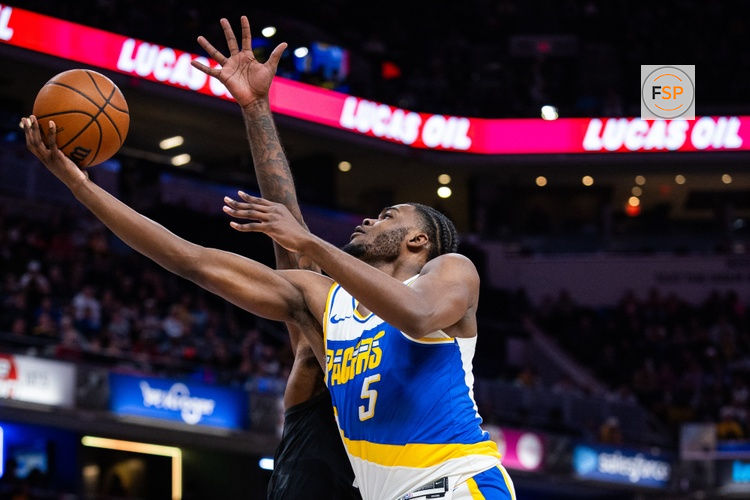 Feb 2, 2026; Indianapolis, Indiana, USA;  Indiana Pacers forward Jarace Walker (5) shoots the ball while Houston Rockets forward Jabari Smith Jr. (10) defends in the second half at Gainbridge Fieldhouse. Credit: Trevor Ruszkowski-Imagn Images