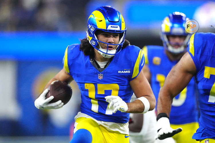 Dec 28, 2024; Inglewood, California, USA; Los Angeles Rams wide receiver Puka Nacua (17) carries the ball against the Arizona Cardinals in the second half at SoFi Stadium. Credit: Kirby Lee-Imagn Images